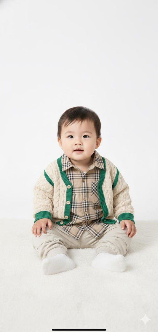 Long-sleeved, collared shirt with a plaid pattern in shades of beige.