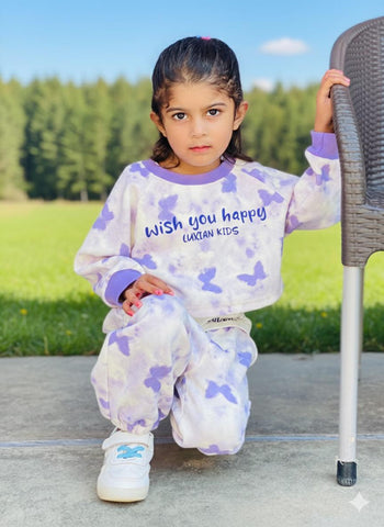 Likely cotton or a cotton blend, given the casual, comfy look typical of kids' clothing.